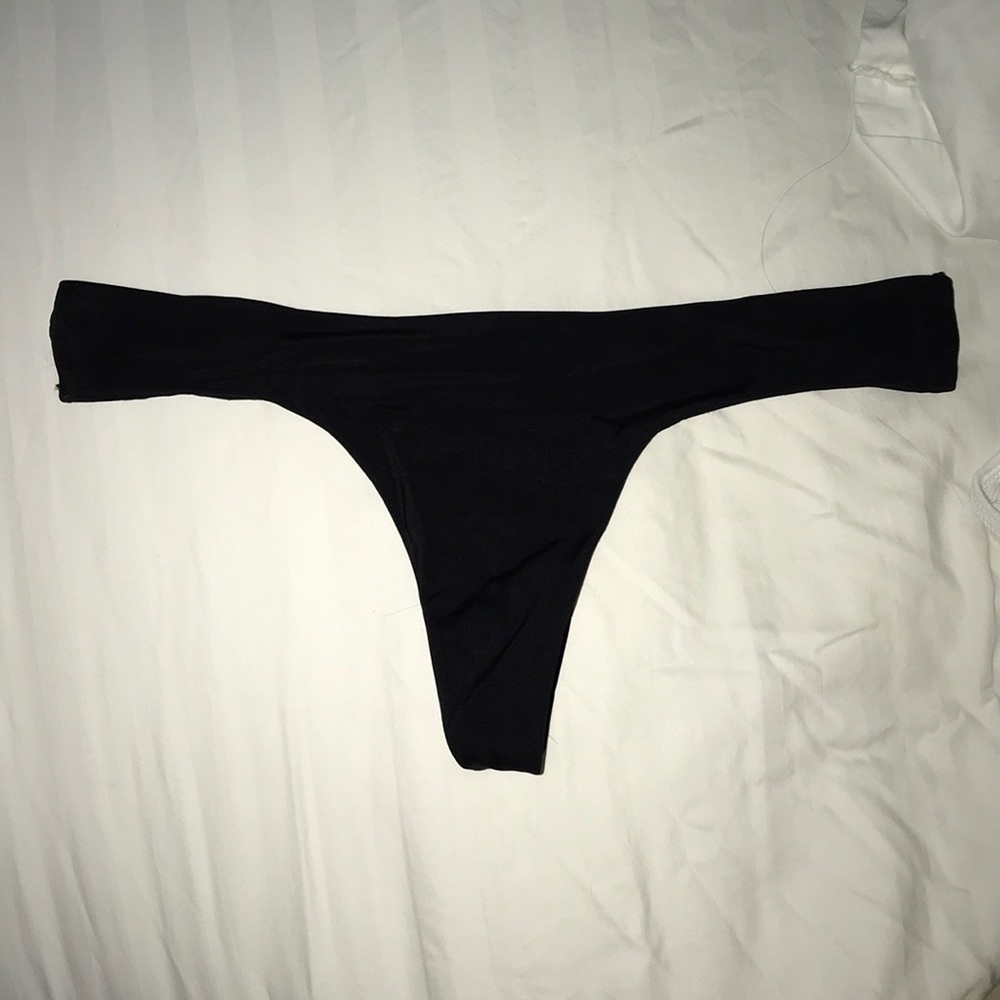Black cheeky Victoria secret bottoms